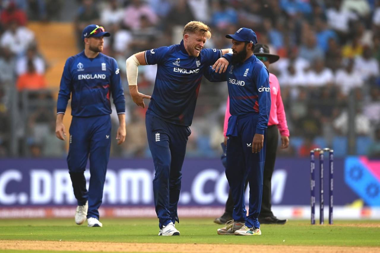 David Willey in pain after picking up a muscle cramp, England vs South Africa, Men's World Cup 2023, Mumbai, October 21, 2023