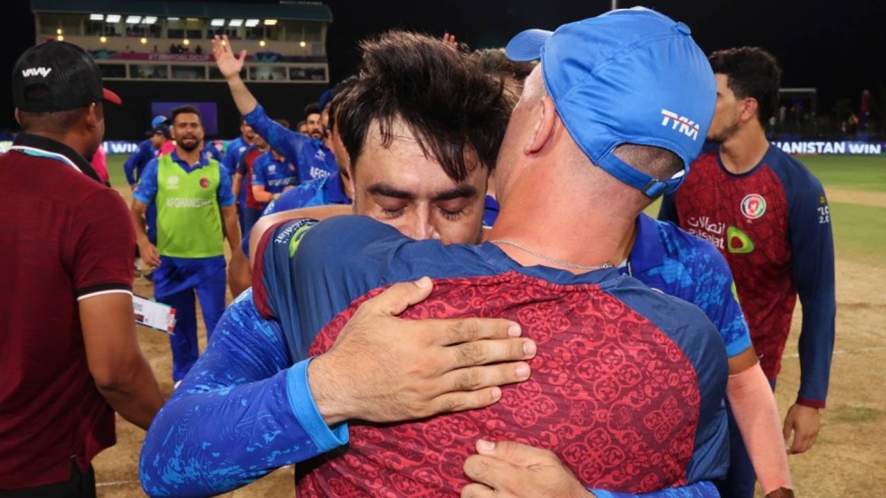 Rashid Khan and Jonathan Trott embrace after their semi-final spot was confirmed, Afghanistan vs Bangladesh, Super Eight, Group 1, Men's T20 World Cup 2024, Kingstown, June 25, 2024