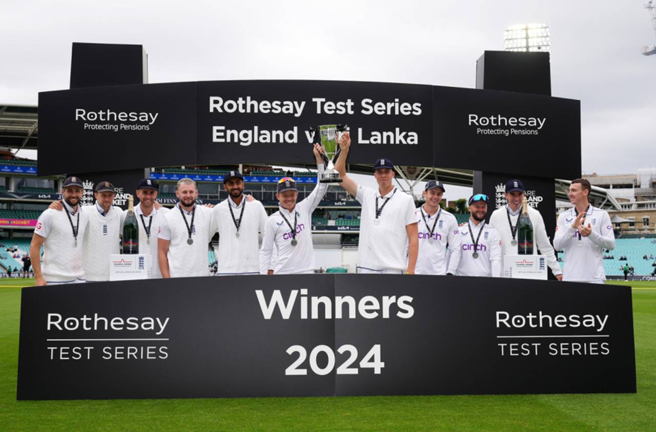 England players pose for photos as Ollie Pope and Josh Hull lift up the trophy, England vs Sri Lanka, 3rd Men's Test, The Oval, London, 4th day, September 9, 2024