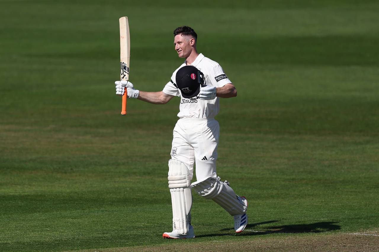 Cameron Bancroft raises his bat on reaching three figures, Gloucestershire vs Glamorgan, County Championship, Bristol, April 11, 2025
