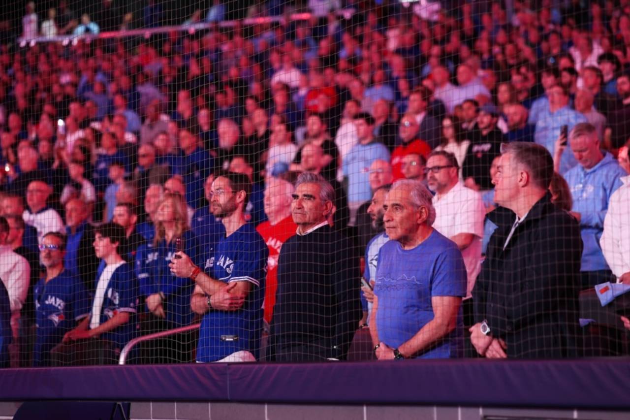 Actor Eugene Levy watches a baseball match, Toronto, March 27, 2025