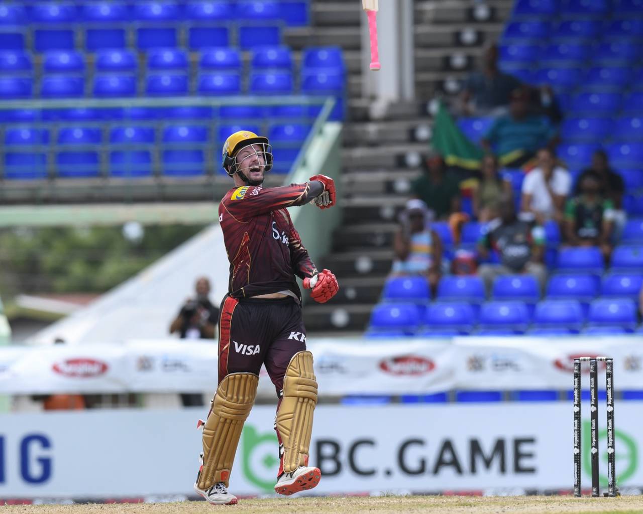 Colin Munro flips his bat up in celebration of his century, St Kitts & Nevis Patriots vs Trinbago Knight Riders, CPL 2025, Basseterre, August 17, 2025 
