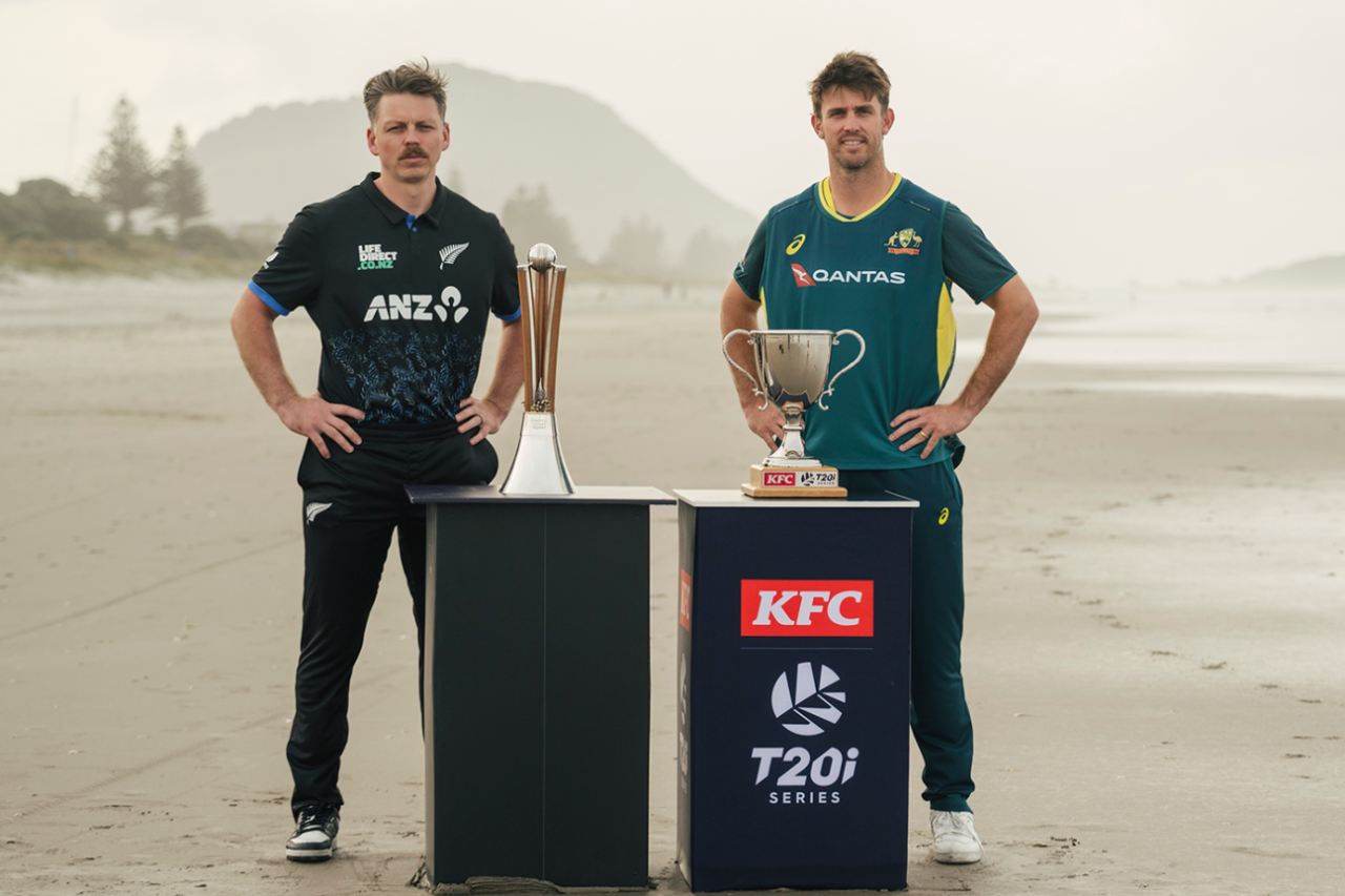 Michael Bracewell and Mitchell Marsh pose with the Chappell-Hadlee and T20I series trophies, Mount Maunganui, September 28, 2025