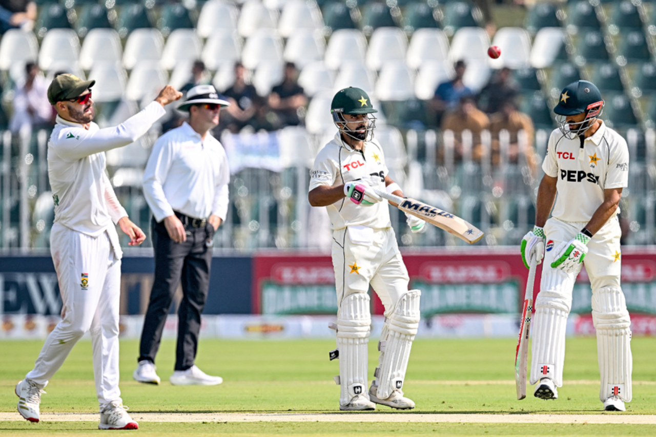 Aiden Markram throws the ball as Abdullah Shafique and Shan Masood chat, Pakistan vs South Africa, 2nd Test, Rawalpindi, 2nd day, October 21, 2025