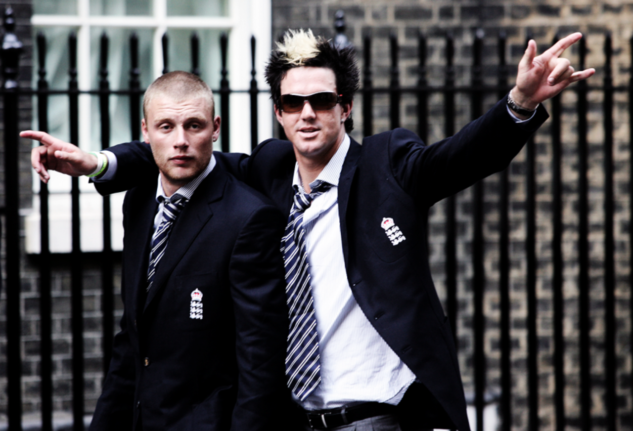 An unsteady Andrew Flintoff heads towards No. 10 Downing Street, helped by Kevin Pietersen, London,  September 13, 2005