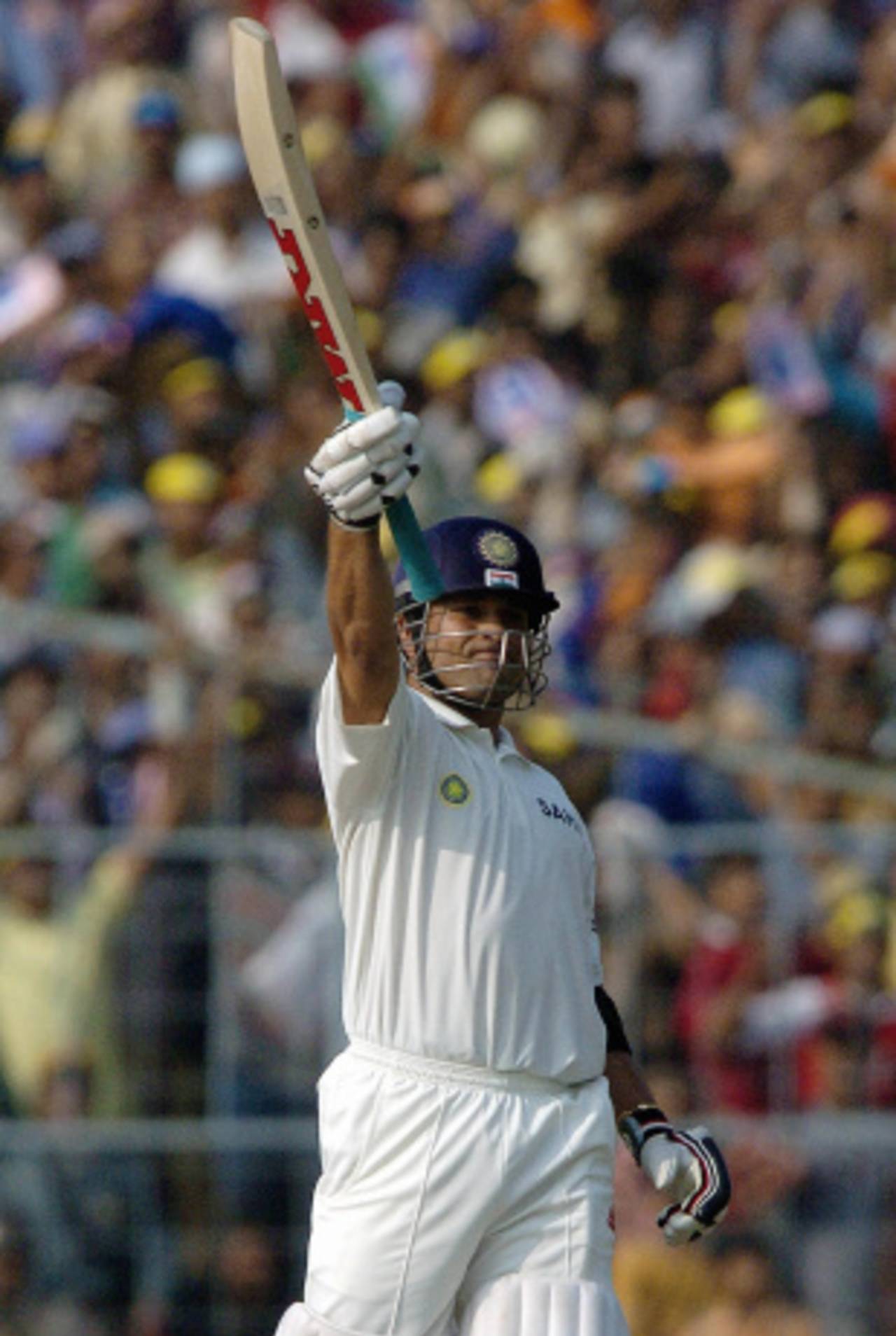 Sachin Tendulkar waves his bat in joy after hitting the winning runs, India v South Africa, fifth day, second Test, Kolkata, December 2 2004