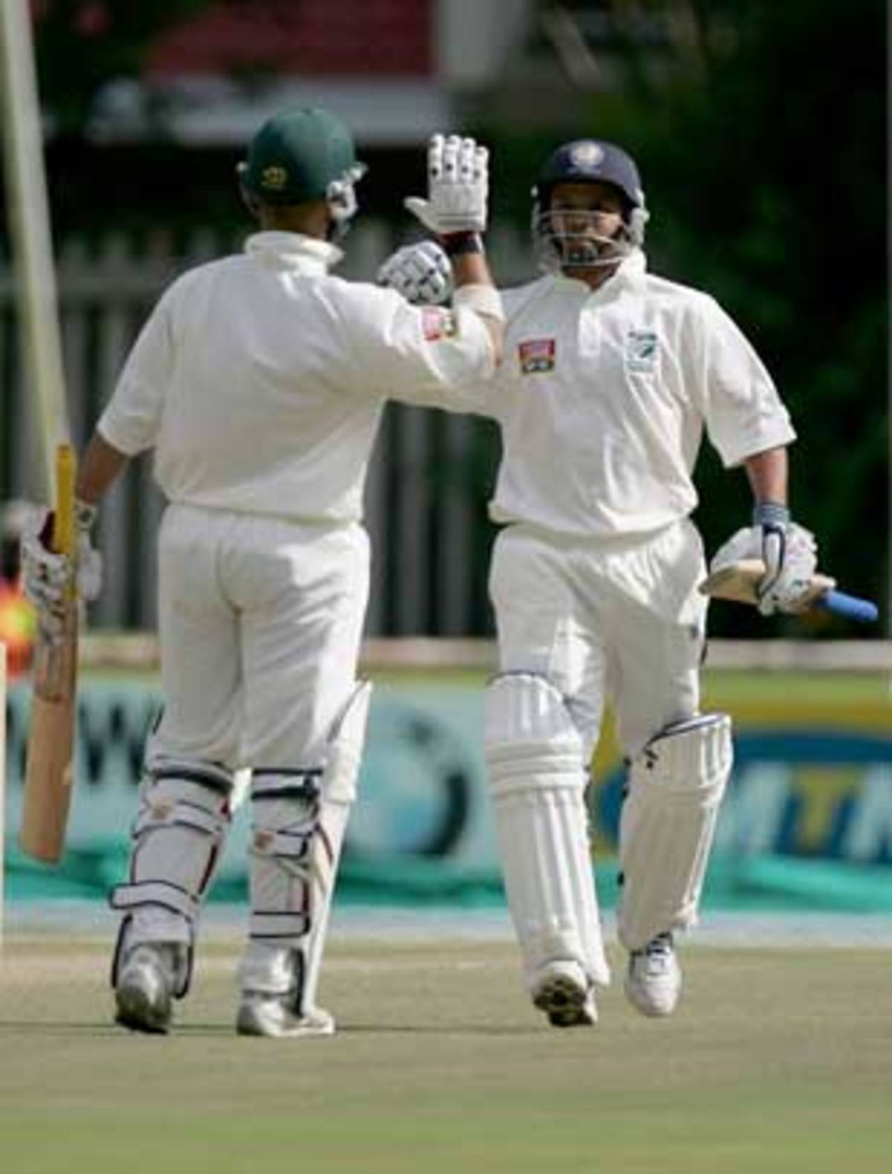 JP Duminy and Ashwell Prince celebrate South Africa A's victory over England XI, Potchefstroom, December 13, 2004