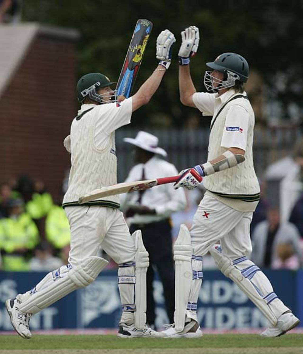 Brett Lee and Glenn McGrath celebrate the draw, England v Australia, 3rd Test, Old Trafford, August 15, 2005