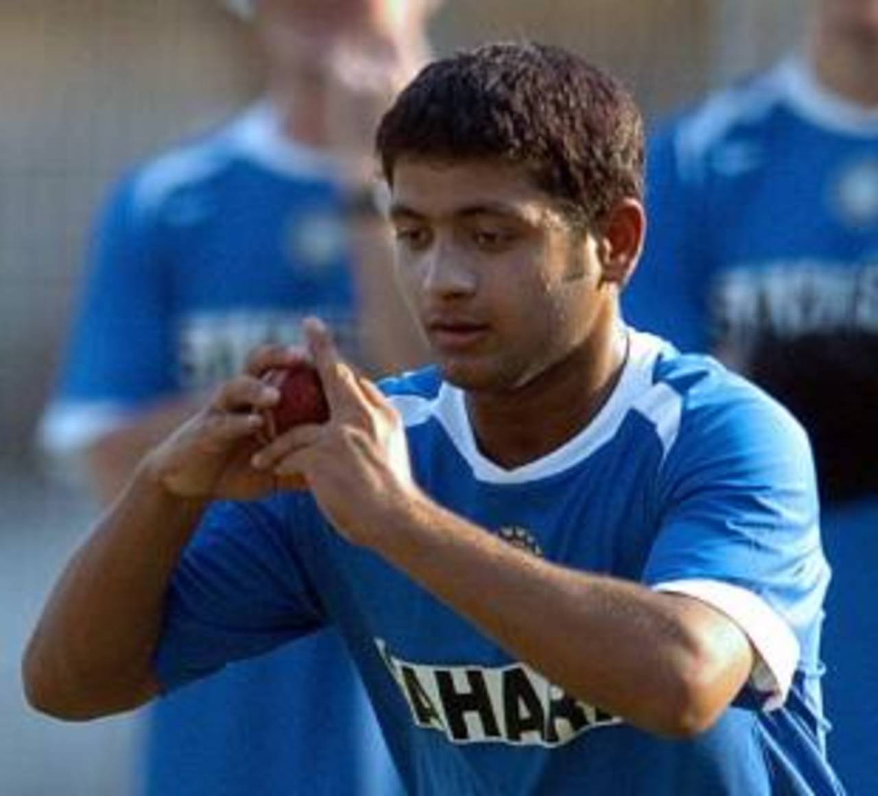 Piyush Chawla prepares to bowl during a practice session at Nagpur, February 26, 2005