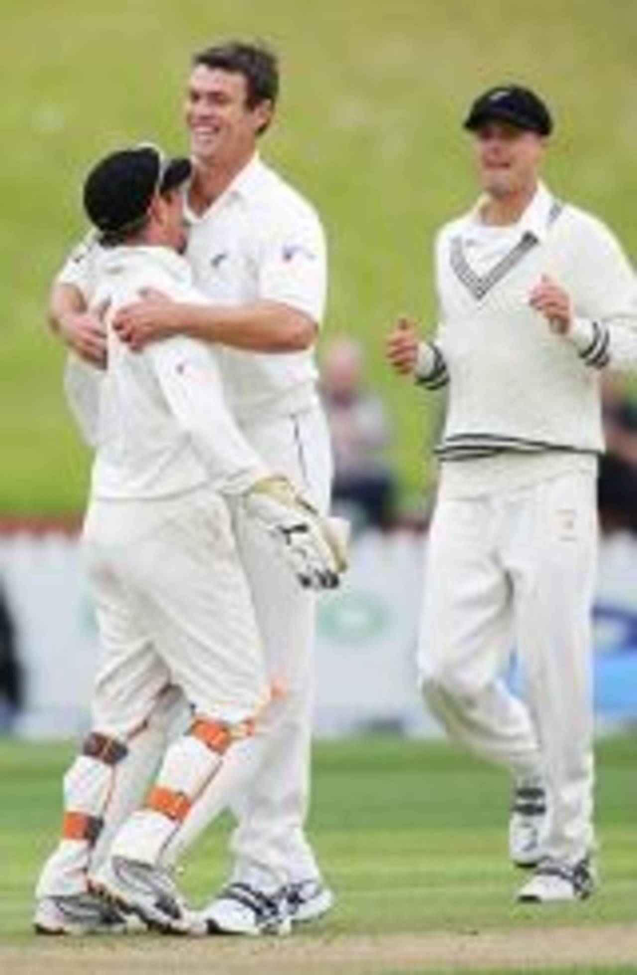 James Franklin is congratulated ny his team-mates after taking his fifth wicket, New Zealand v West Indies, 2nd Test, Wellington, 1st day, March 17 2006