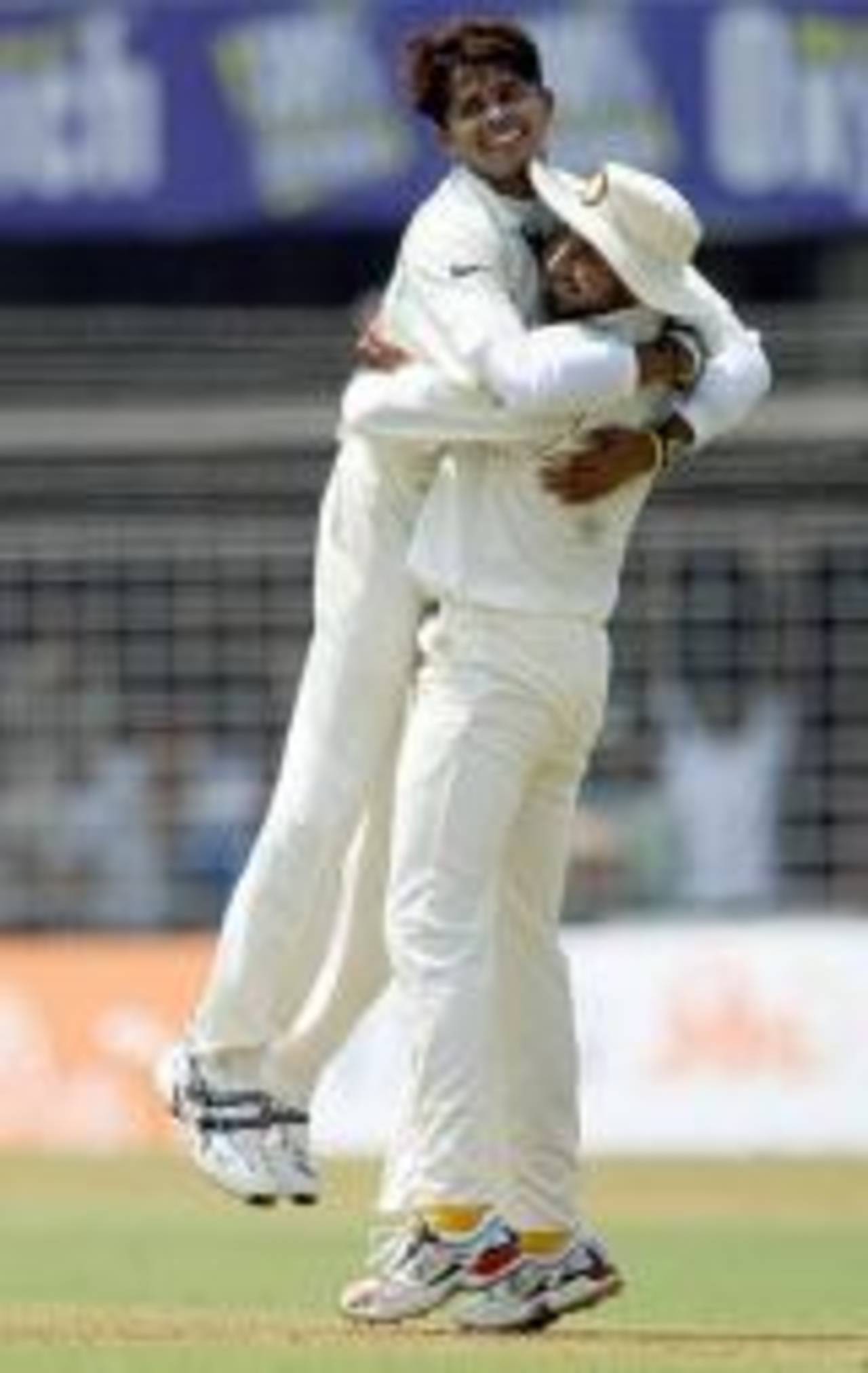Sreesanth and Harbhajan Singh celebrate Ian Bell's wicket, India v England, 3rd Test, Mumbai, 1st day, March 18, 2006