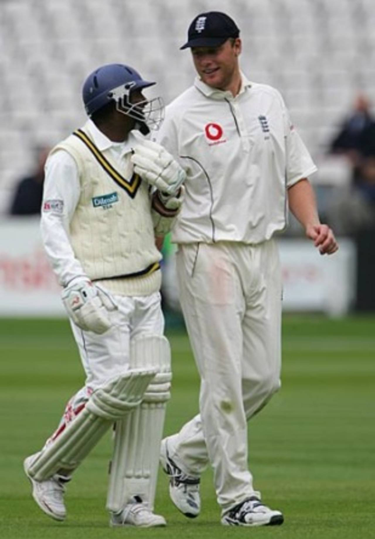 Andrew Flintoff and Muttiah Muralitharan chat after bad light forced players off, England v Sri Lanka, 1st Test, Lord's, May 15, 2006