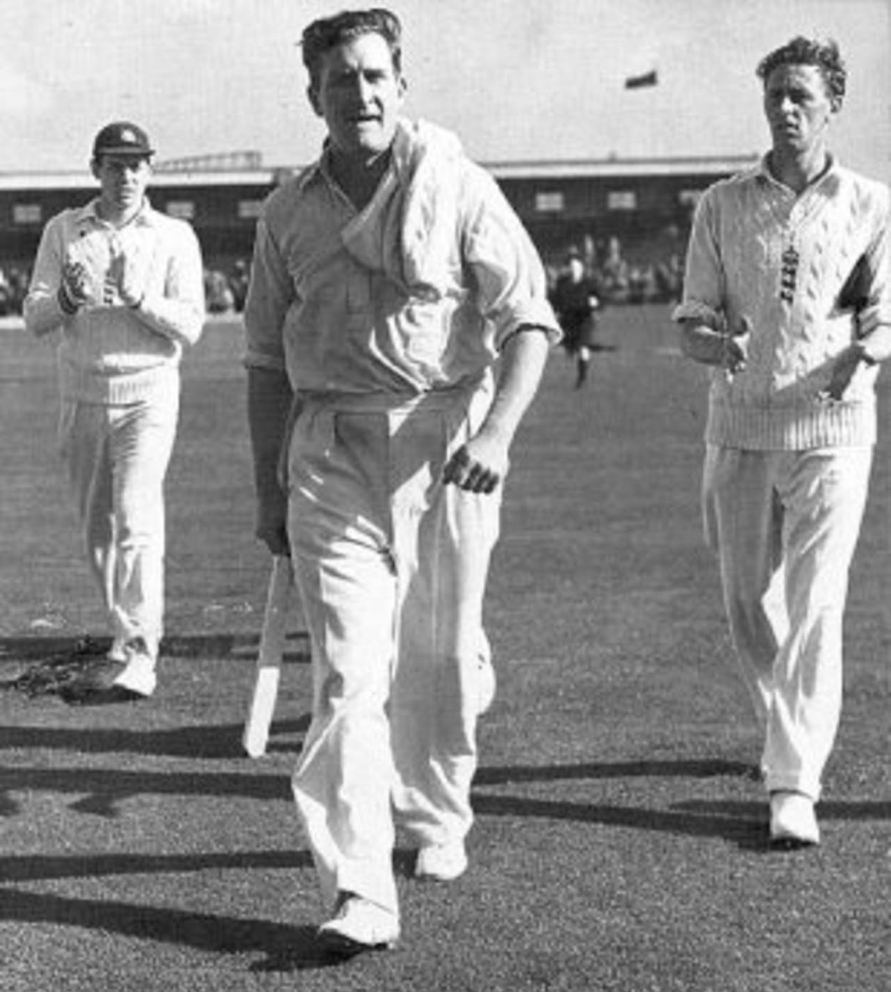 A job well done - Jim Laker ambles off after his 19-wicket haul, England v Australia, 4th Test, Old Trafford, 5th day, July 31, 1956