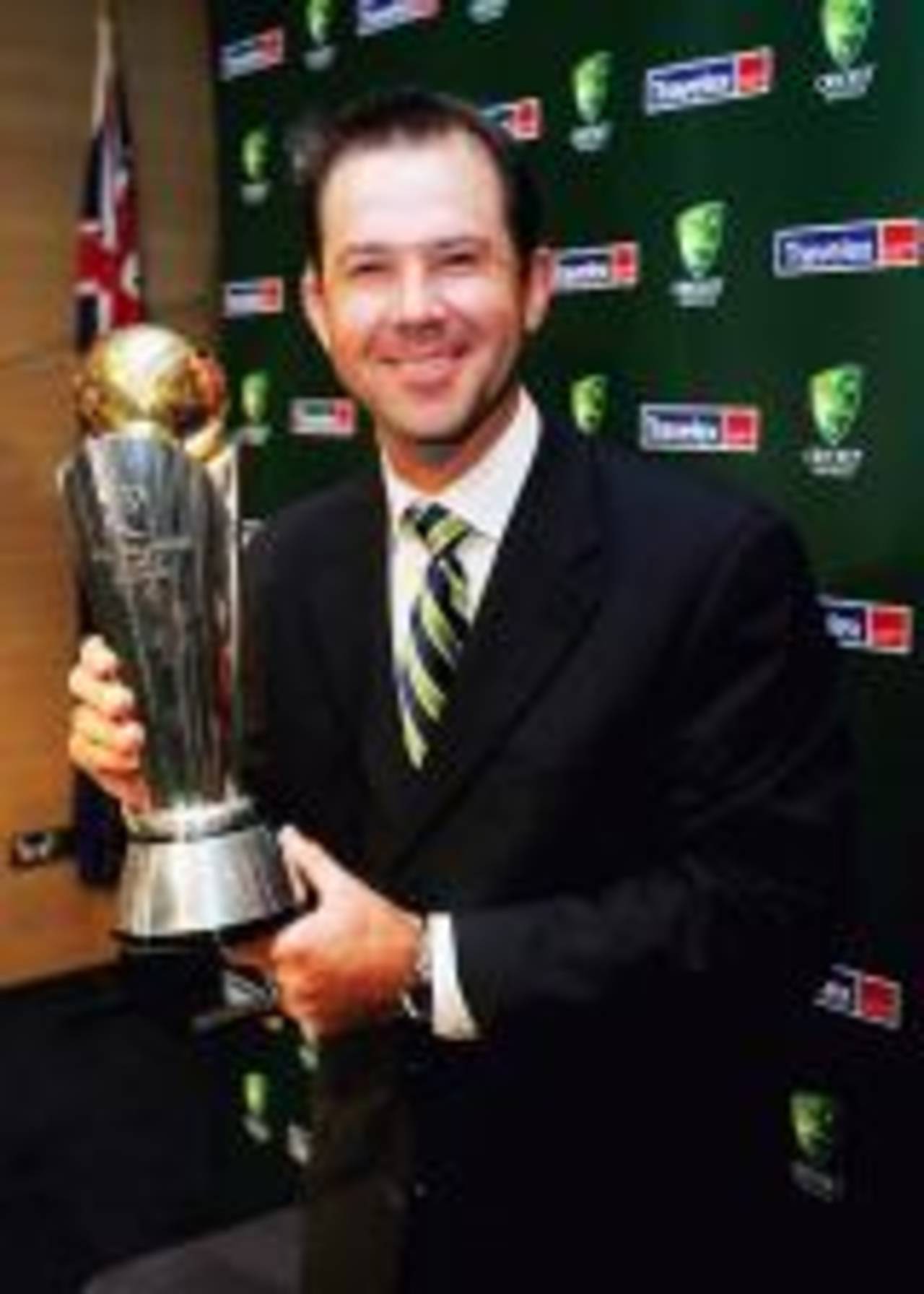 Ricky Ponting poses with the Champions Trophy on arrival at Sydney International Airport after Australia's Champions Trophy victory, Sydney, November 7, 2006 