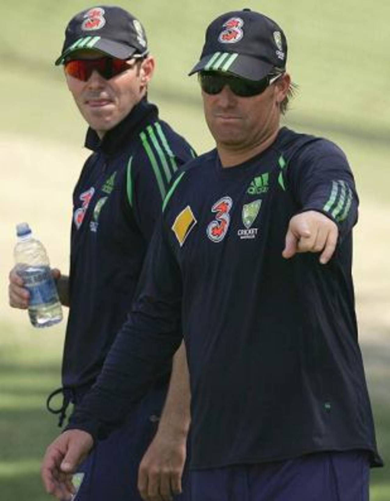 Damien Martyn and Shane Warne take a break during a training session, Adelaide, November 29, 2006 