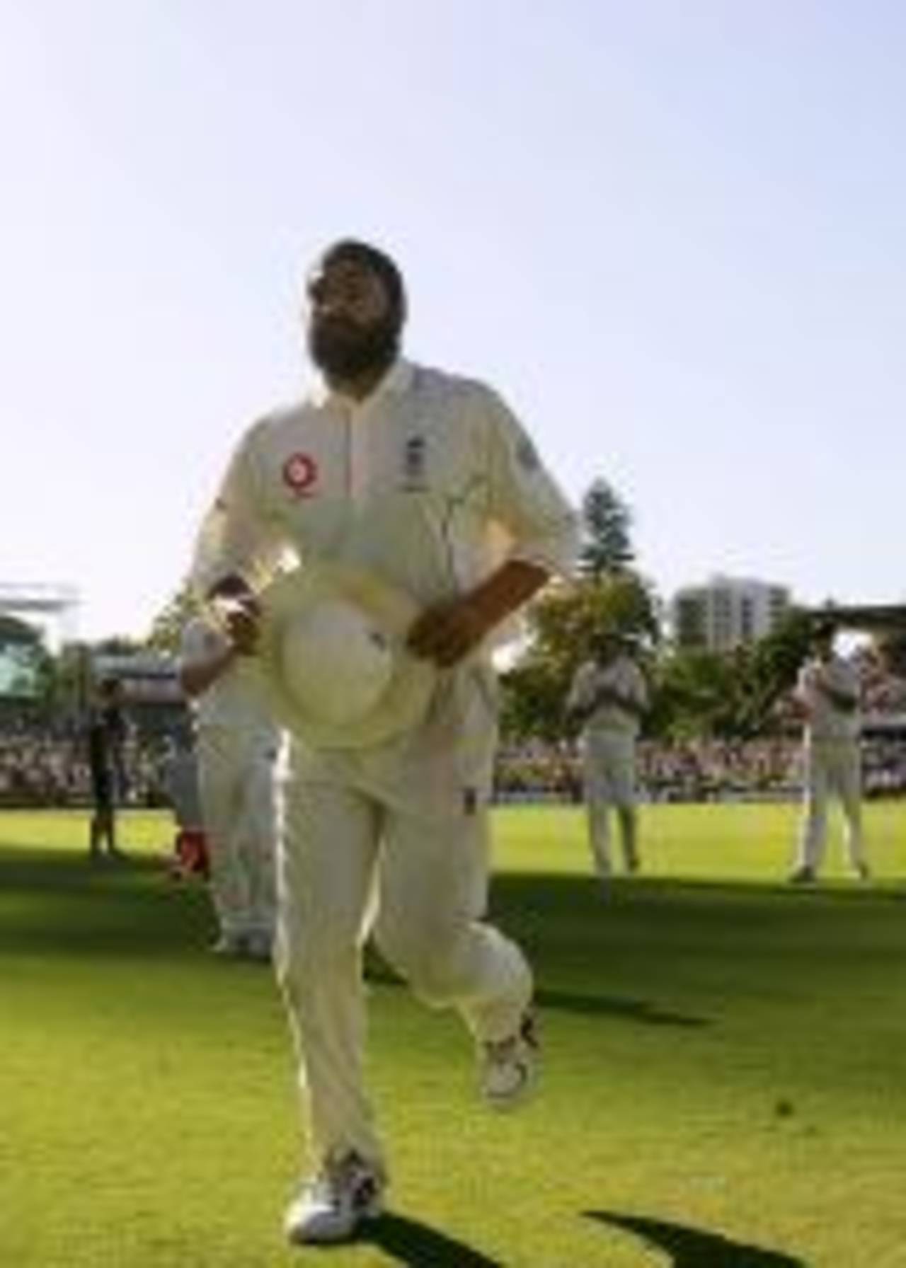 Monty Panesar leads his team-mates from the field after taking five wickets, Australia v England, 3rd Test, Perth, December 14, 2006