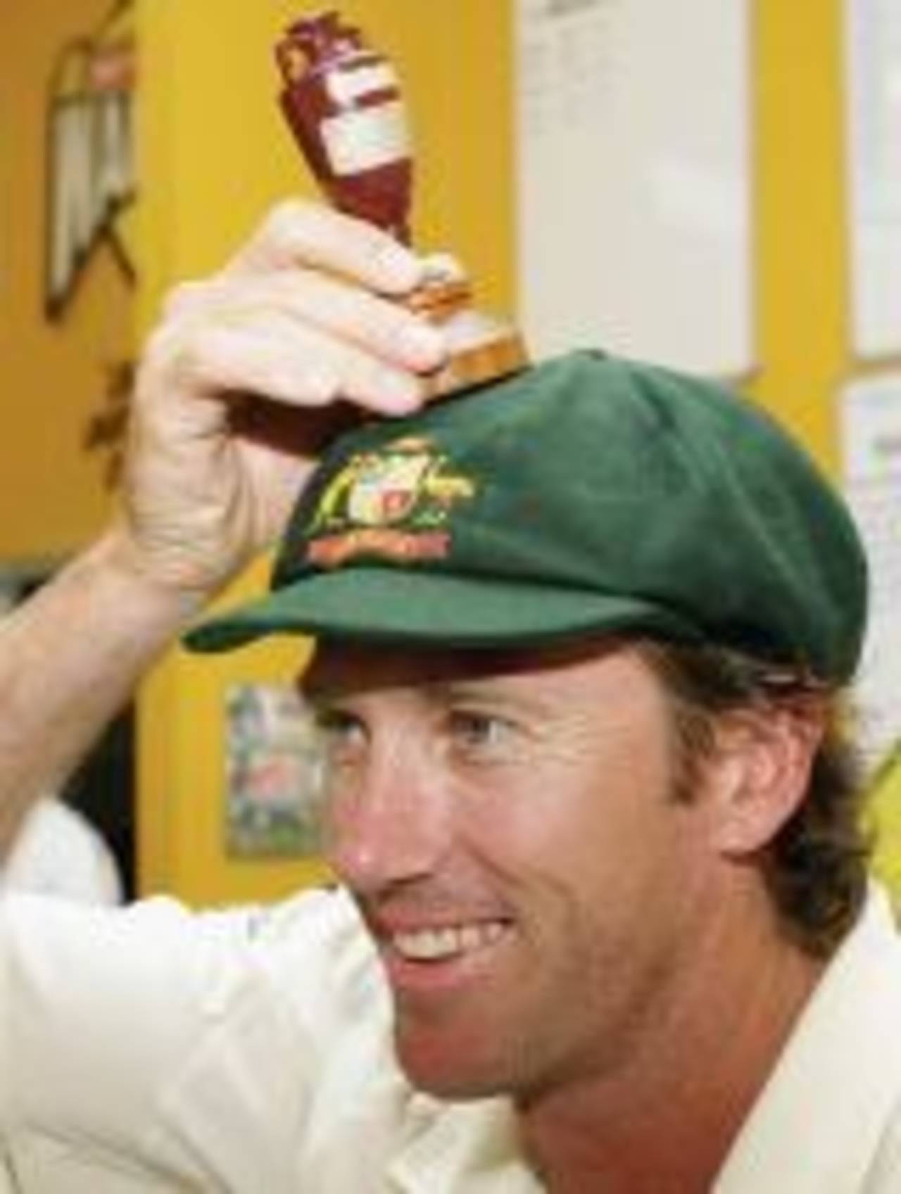 Glenn McGrath acts the fool celebrating Australias Ashes win, Australia v England, 3rd Test, Perth, December 18, 2006