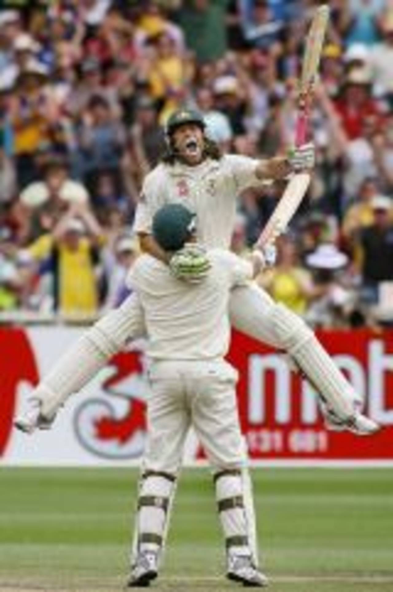 He aint heavy: Andrew Symonds jumps for joy with his partner Matthew Hayden after scoring his first Test century, Australia v England, 4th Test, Melbourne, December 27, 2006