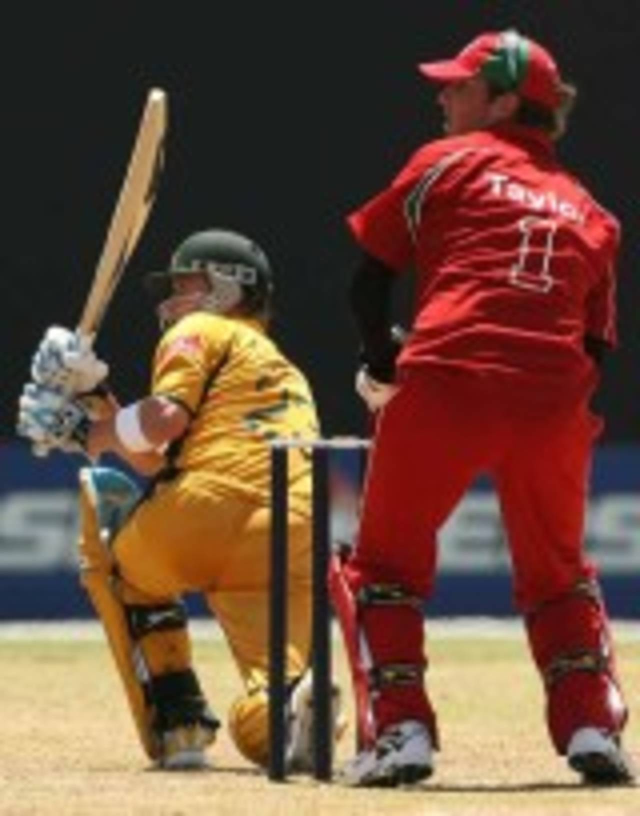 Michael Clarke sweeps to the square leg as Brendon Taylor looks on, Australia v Zimbabwe, World Cup warm up, Arnos Vale Complex, Kingstown, St Vincent, March 6, 2007
