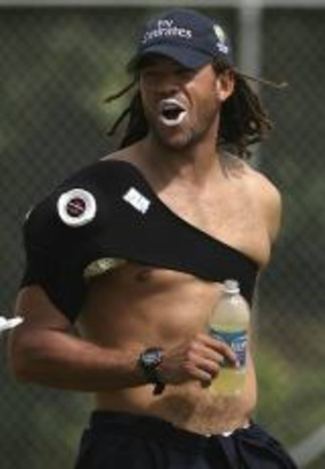 Andrew Symonds with his injured arm strapped at Australia's training, Kingstown, St Vincent, March 5, 2007
