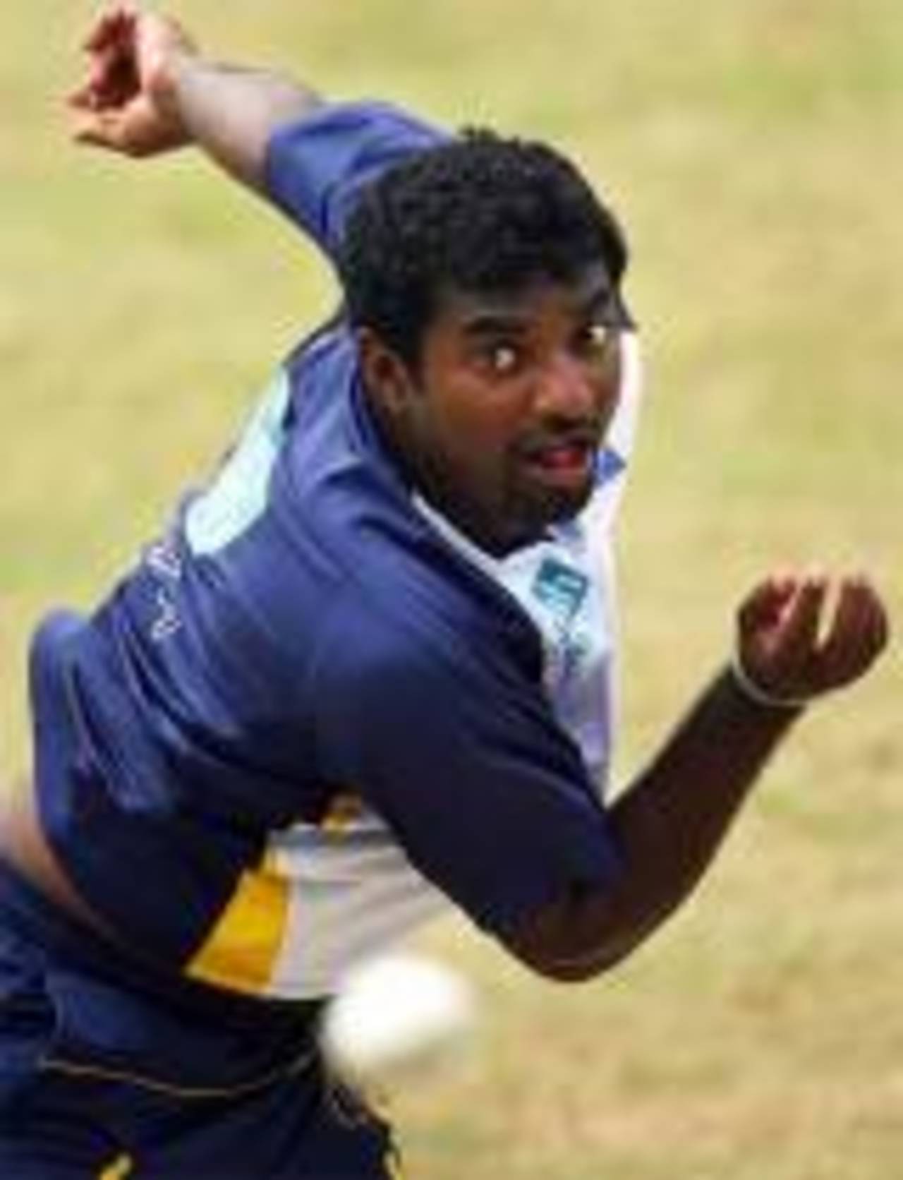 Muttiah Muralitharan gets into his usual spin in training, Guyana, March 31, 2007