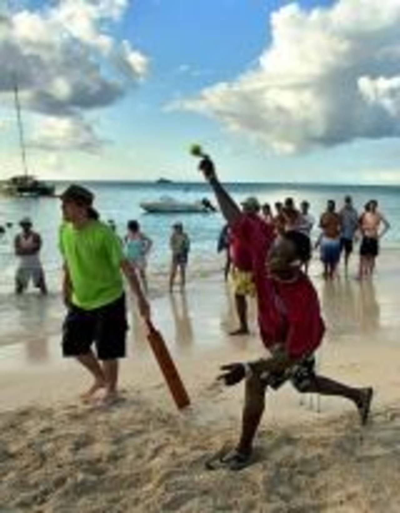 Richie Richardson bowls during a game of beach cricket, St. John's, April 6, 2007