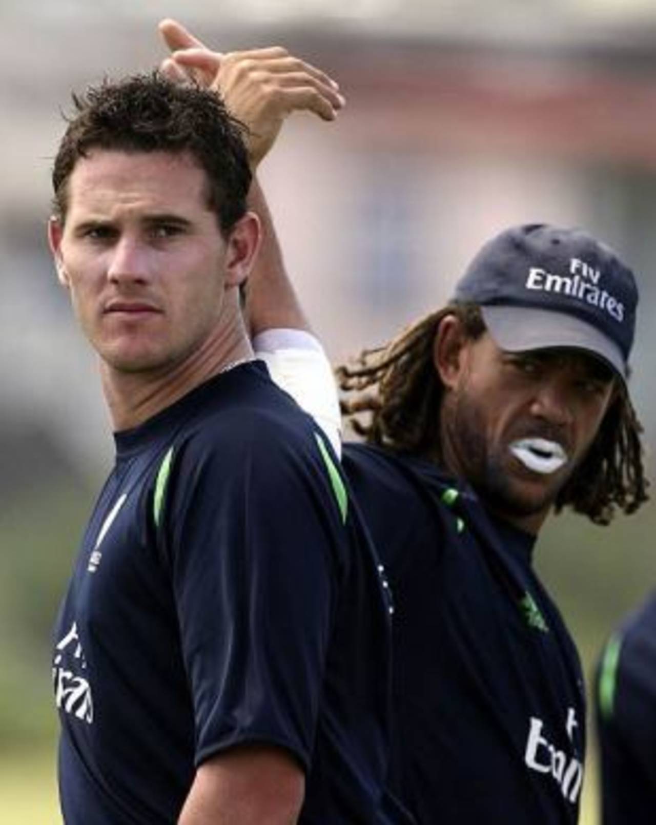 Shaun Tait and Andrew Symonds do some stretches at training, Bridgetown, Barbados, April 11, 2007
