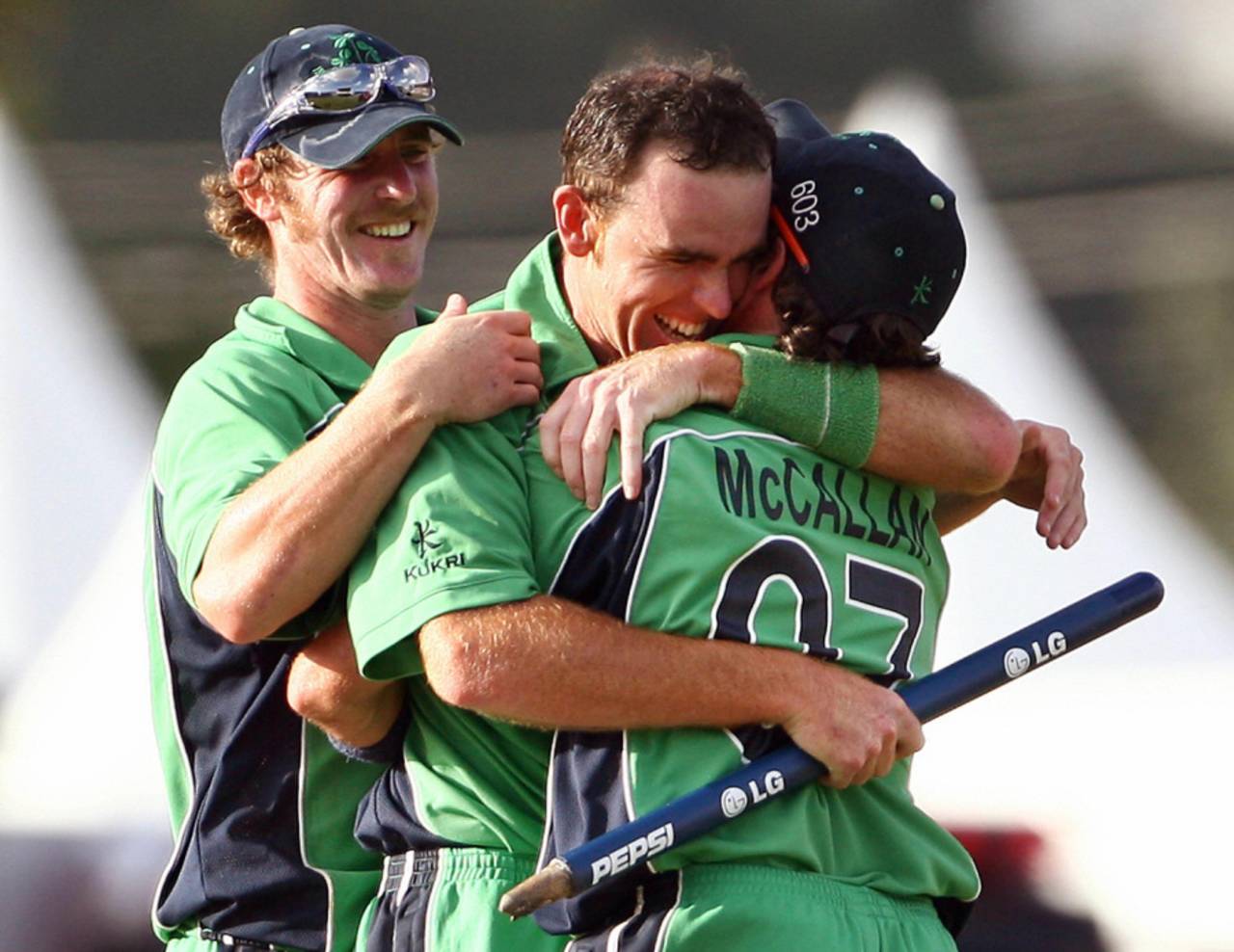  Trent Johnston celebrates the comprehensive win with Kyle McCallan and John Mooney , Bangladesh v Ireland, Super Eights, Barbados, April 15, 2007