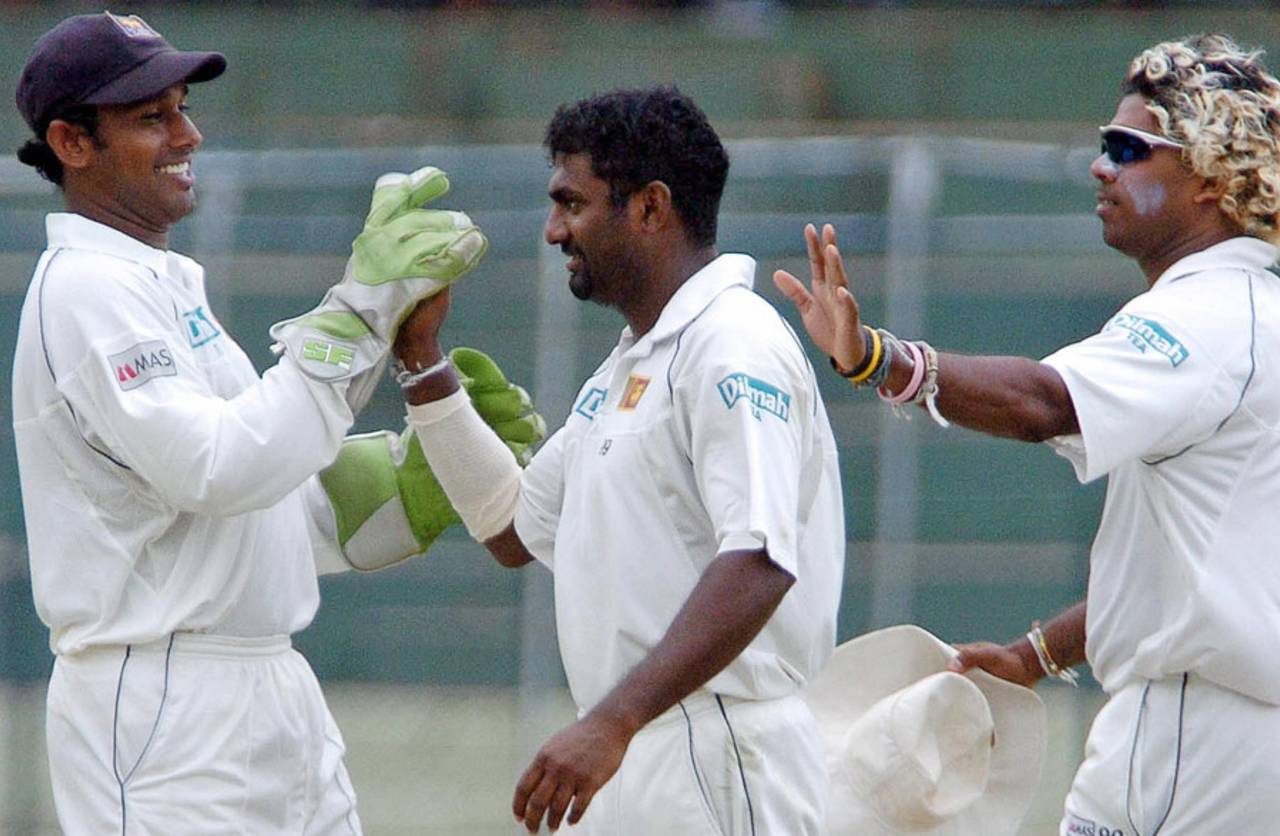 Muttiah Muralitharan is congratulated by Prasanna Jayawardene and Lasith Malinga  after dismissing Mohammad Rafique, Sri Lanka v Bangladesh, 3rd Test, Asgiriya International Stadium, Kandy, 2nd day, July 12, 2007

