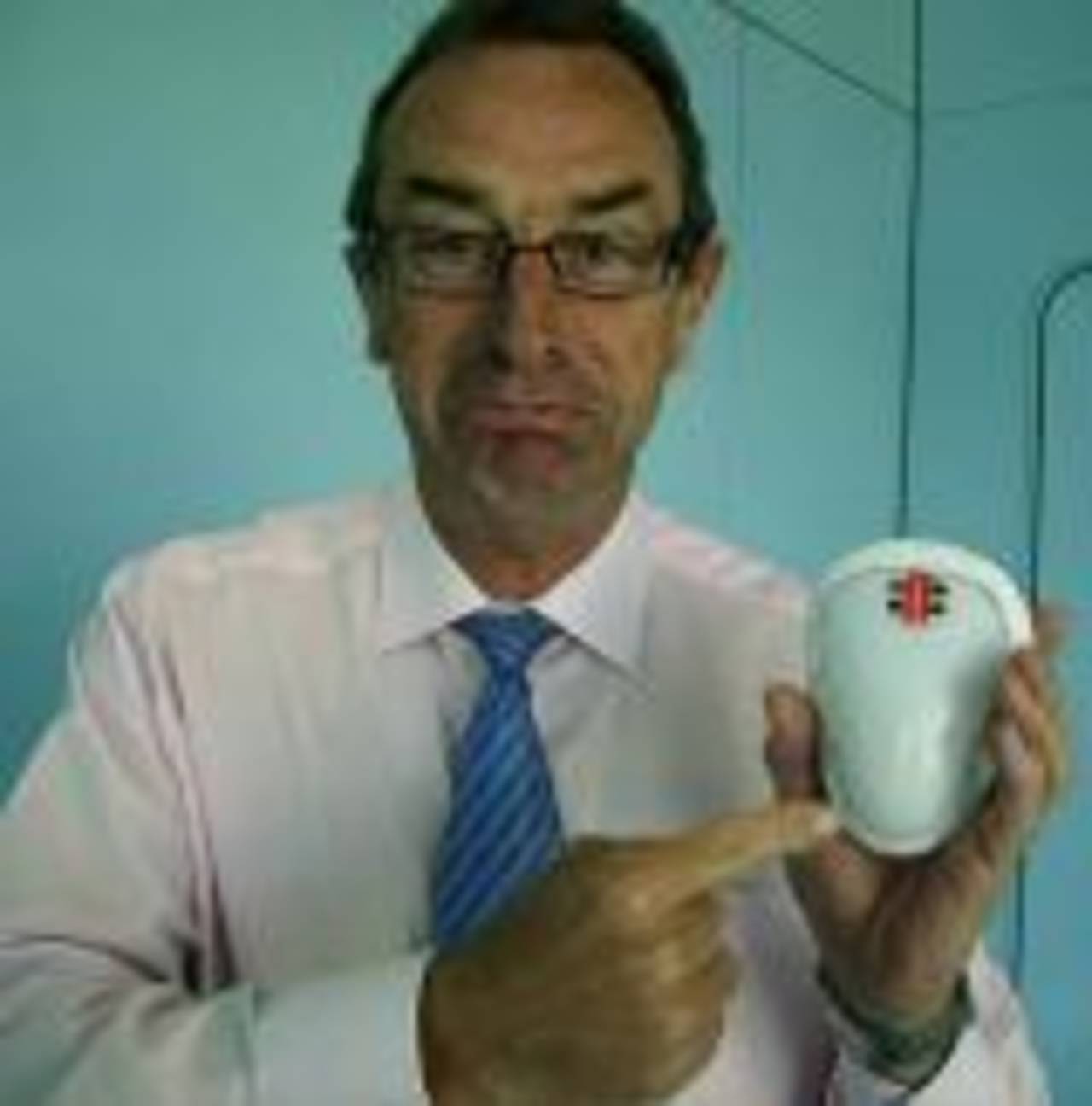 David Lloyd holds up a box, Lord's, July 22, 2007