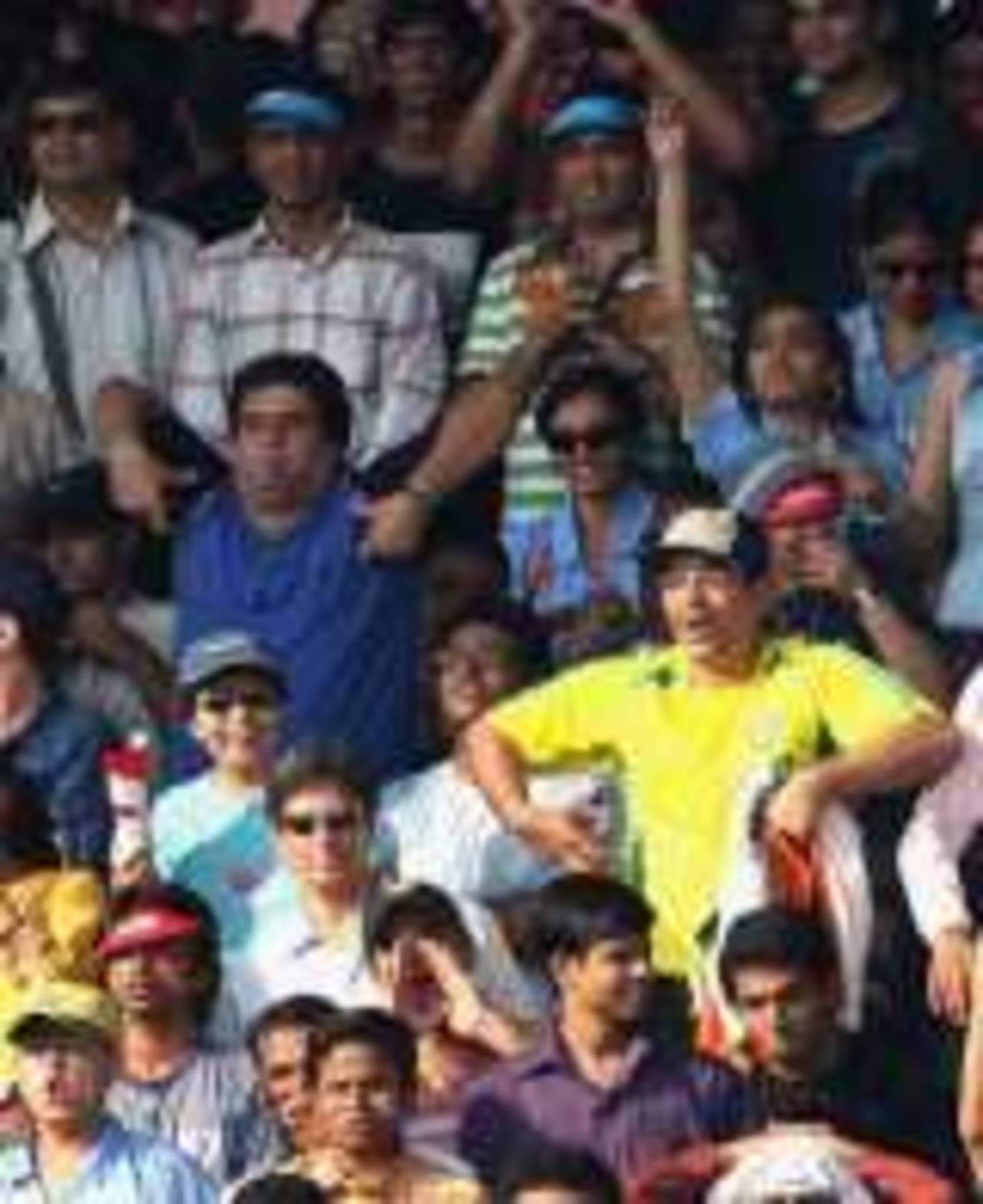 Spectators make 'monkey' impressions as Andrew Symonds of Australia comes in to bat during the seventh one day international match between India and Australia at Wankhede Stadium on October 17, 2007 in Mumbai, India
