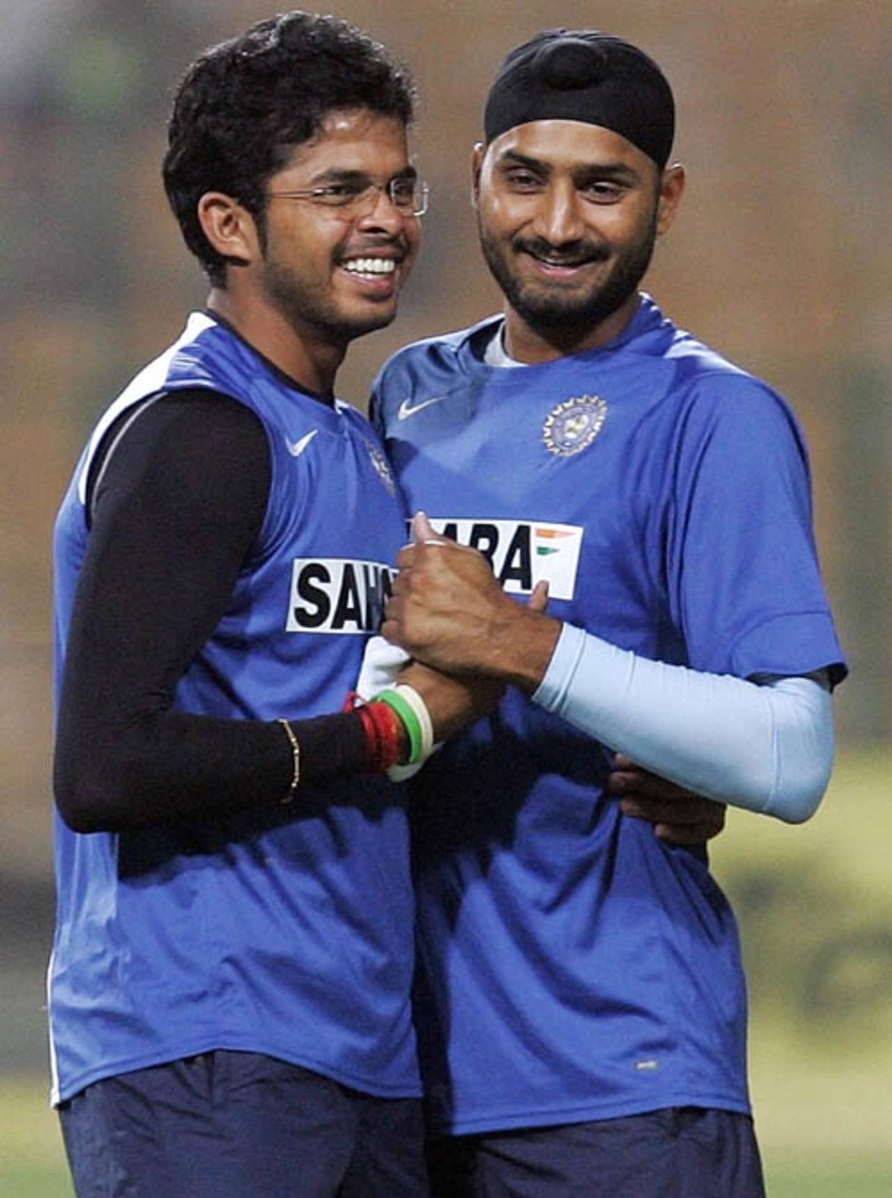 Sreesanth and Harbhajan Singh share a light moment during practice, Gwalior, November 14, 2007