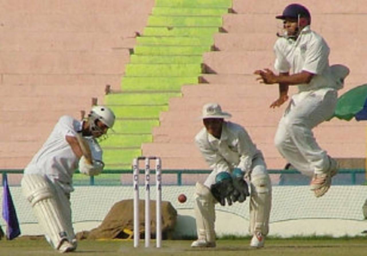 Silly point fielder Amol Sinde gets out of the way as Ravi Inder drives to the off side, Punjab v Hyderabad, Ranji Super League, 2nd round, Group B, 2nd day, November 16, 2007