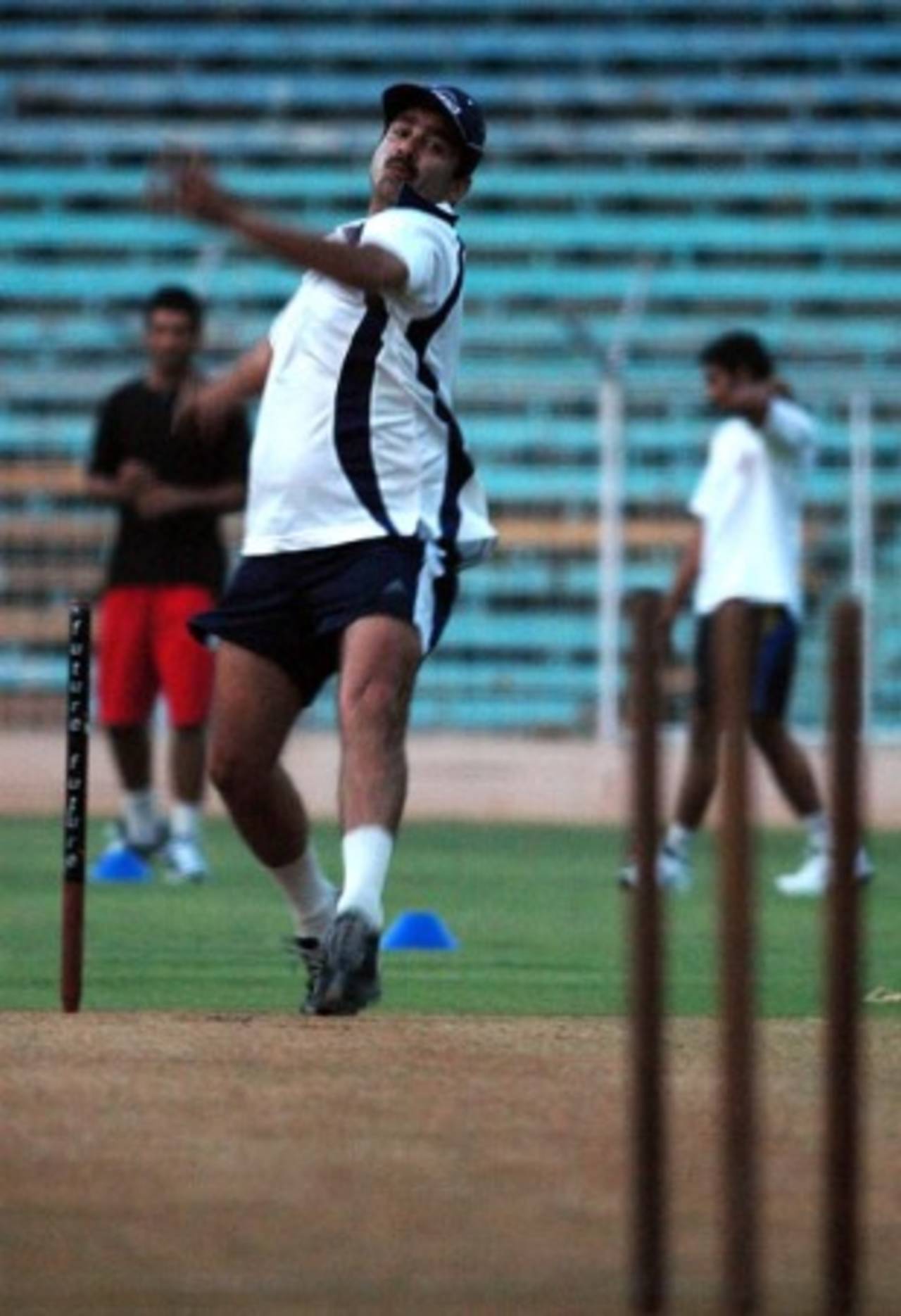 Manoj Prabhakar, Delhi's bowling coach, tries his luck with the cherry during practice at the Wankhede Stadium, Mumbai, November 21, 2007