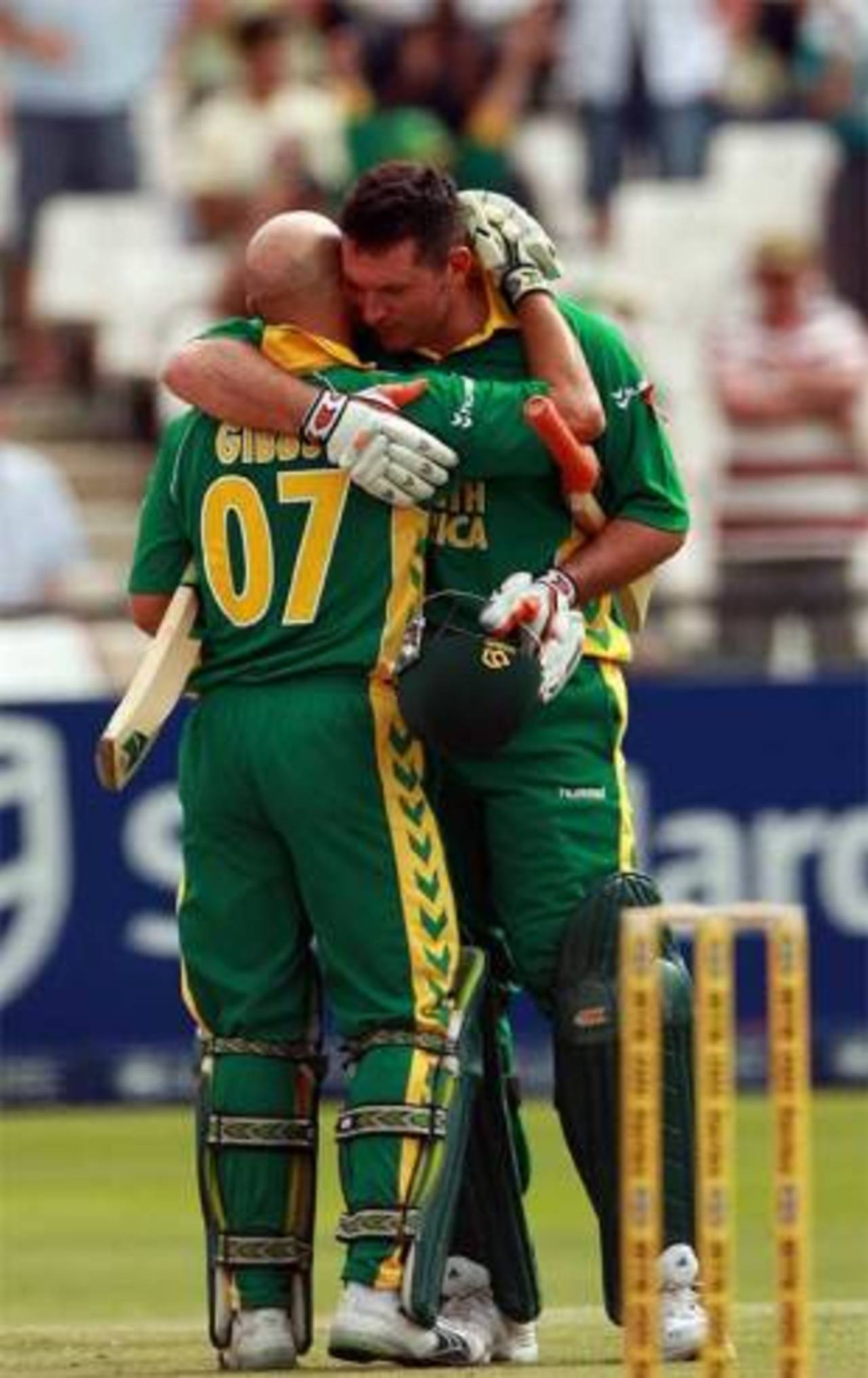 Graeme Smith congratulates Herschelle Gibbs during his blazing knock, South Africa v New Zealand, 3rd ODI, Cape Town, December 2, 2007
