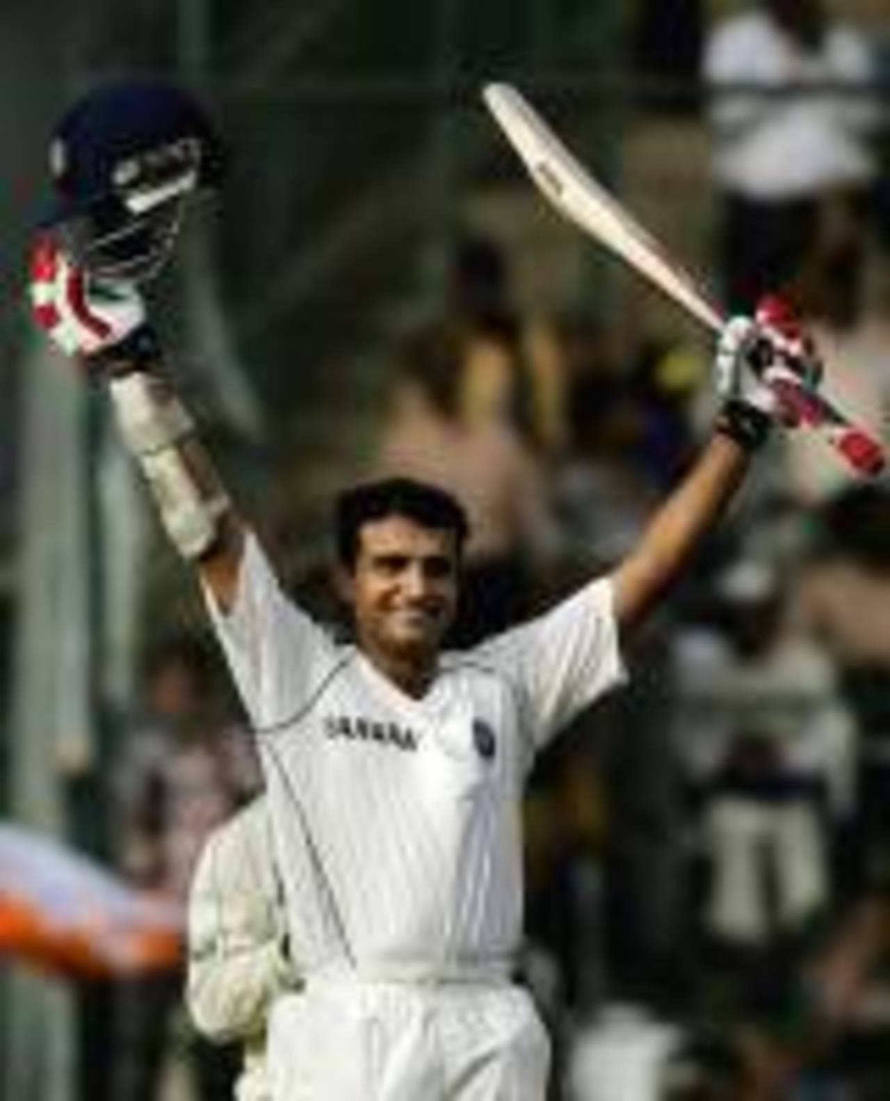 Arms raised as Sourav Ganguly brings up his 15th Test hundred, India v Pakistan, 3rd Test, Bangalore, 1st day, December 8, 2007