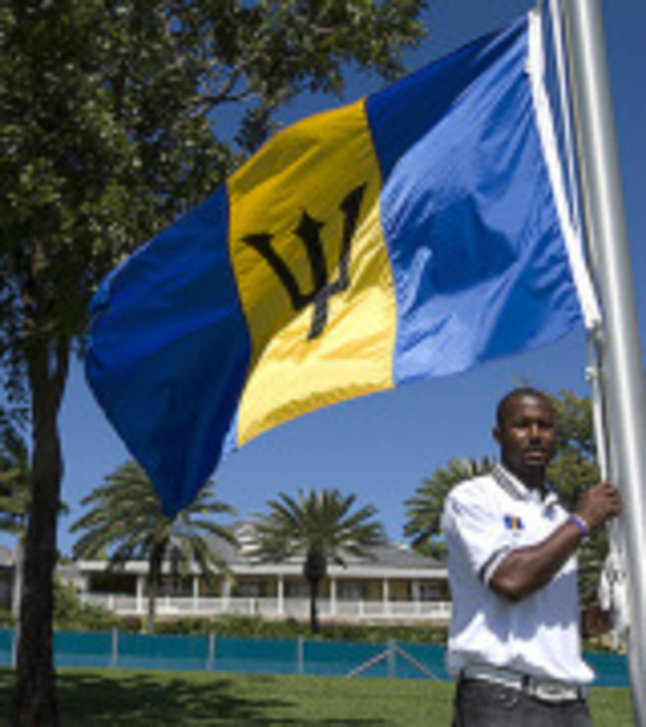 Dwayne Smith proudly stands next to Barbados' flag, January 25, 2008