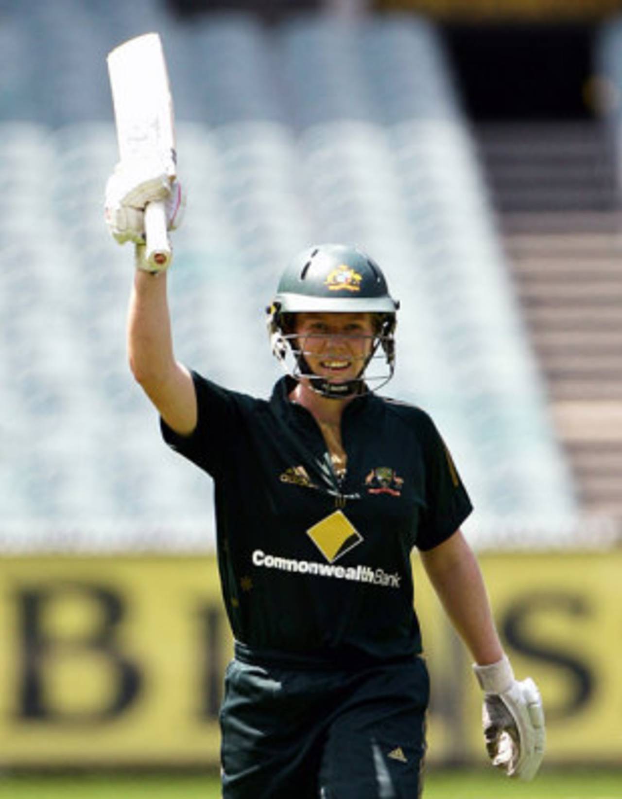 Alex Blackwell raises her bat after getting her maiden one-day hundred, Australia women v England women, 2nd ODI, Melbourne, February 4, 2008
