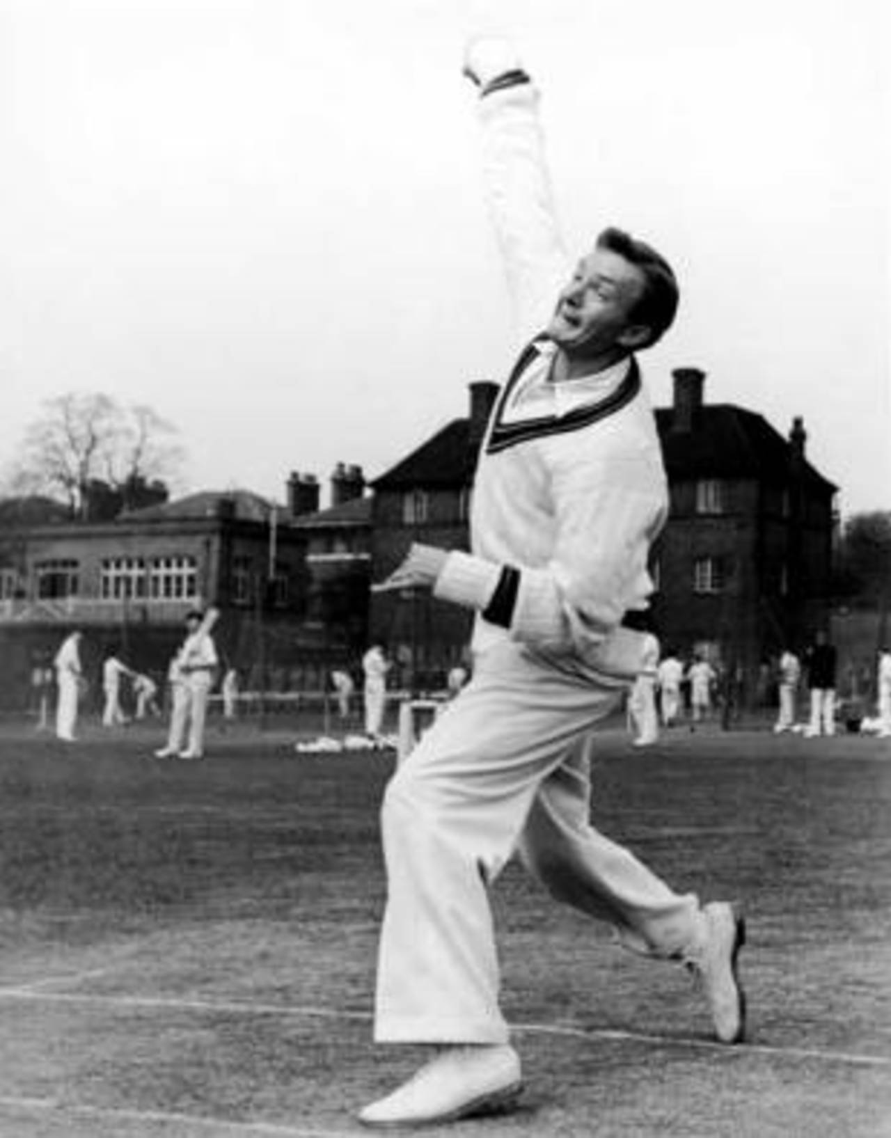 Richie Benaud bowls in the nets during Australia's 1956 tour of England

