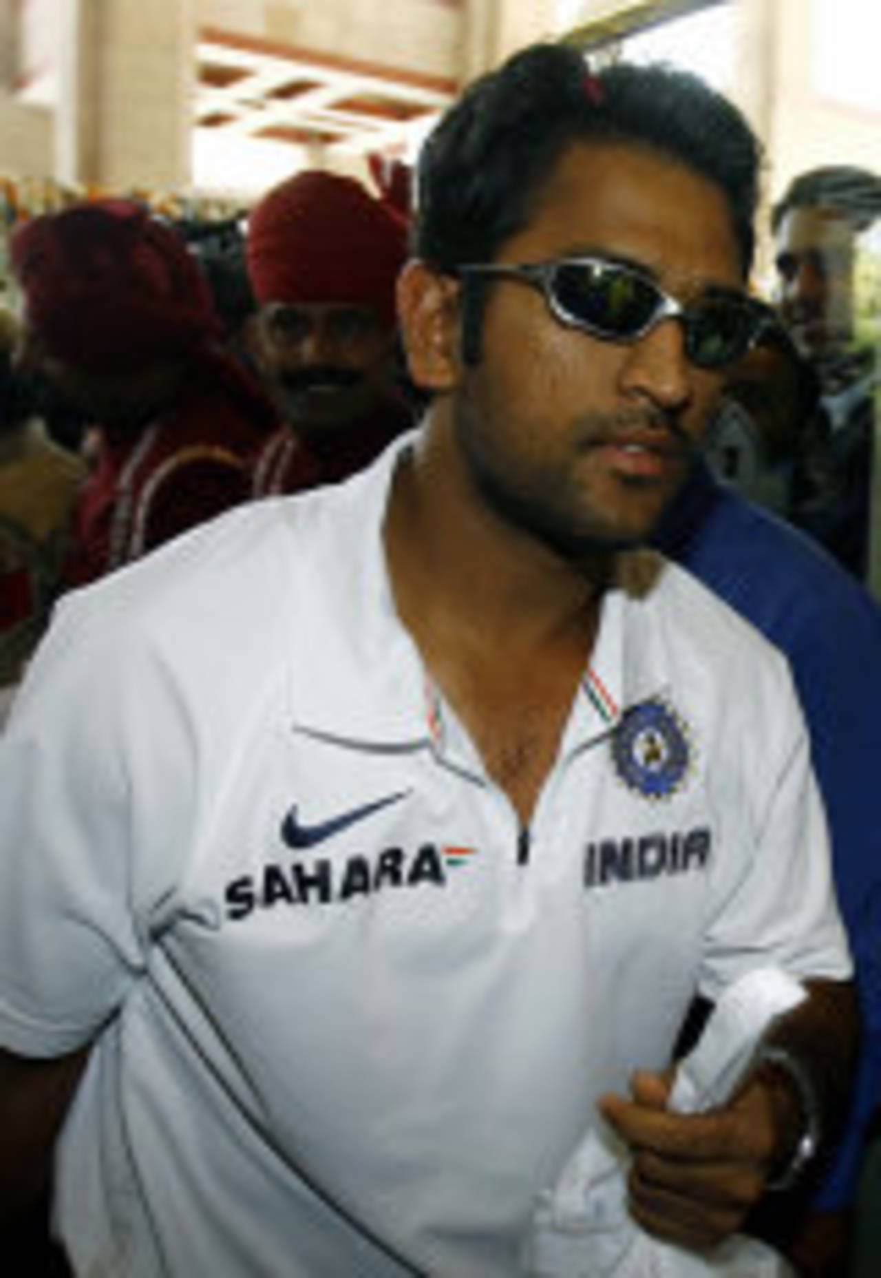 Mahendra Singh Dhoni enters the Intercontinental hotel after arriving from Australia, New Delhi, March 6, 2008