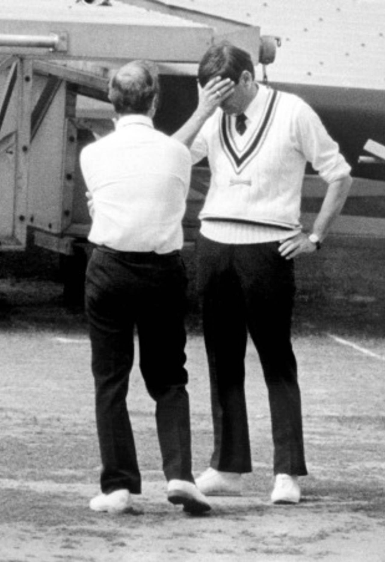 Dickie Bird and David Constant ponder the conditions during the horrendous Saturday of the Centenary Test, England v Australia, Lord's, August 30, 1980