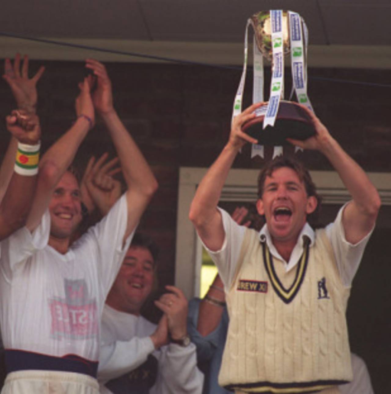 Dermot Reeve lifts the County Championship trophy, Warwickshire v Kent, September 16, 1995