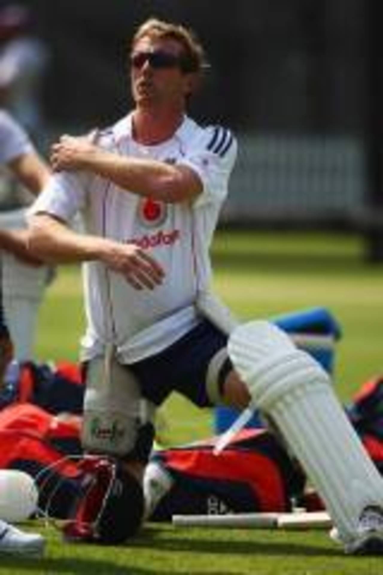 Paul Collingwood feels his troublesome right shoulder, Lord's, May 13, 2008