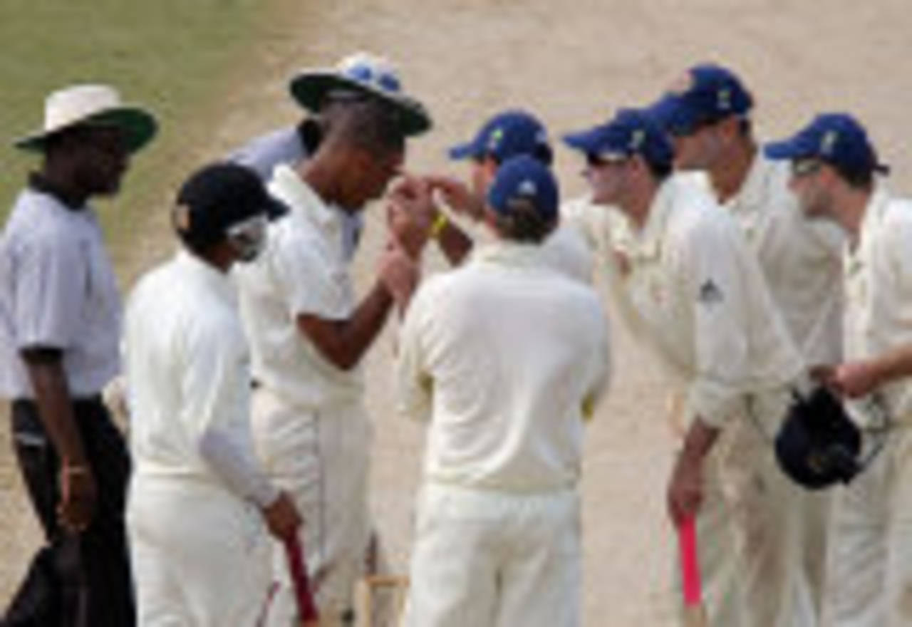 The Australian fielders have a look Gavin Wallace's injury, Jamaica XI v Australians, Trelawny, 1st day, May 16, 2008
