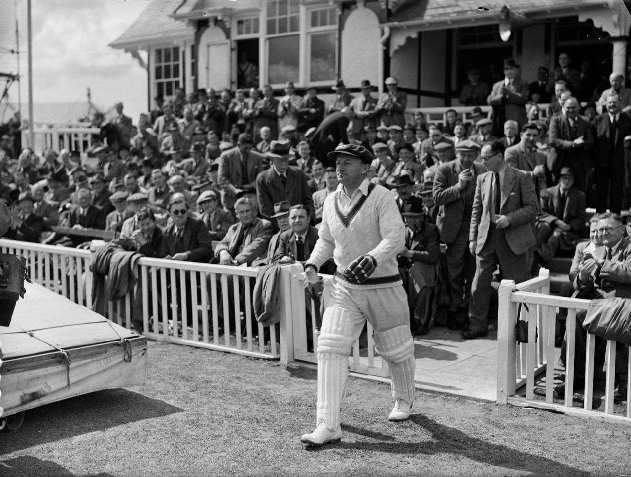 Don Bradman walks out to bat during the tour opener at Worcester. He made 107, Worcestershire v Australians, Worcester, April 29, 1948