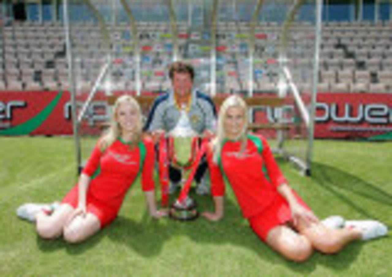 Rob Key poses with the silverware and the npower girls during the Twenty20 Cup South Division Launch, The Rose Bowl Nursery Ground, June 10, 2008