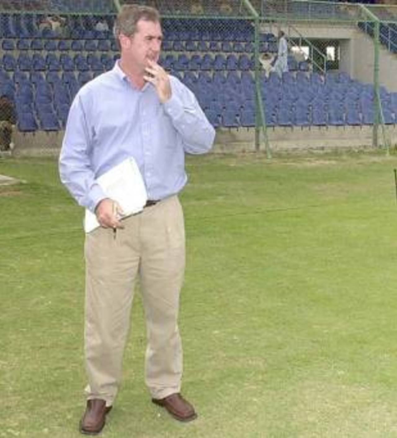 Tim May, CEO of the Australian Cricketers' Association, assesses the security at the National Stadium in Karachi, March 1, 2002 