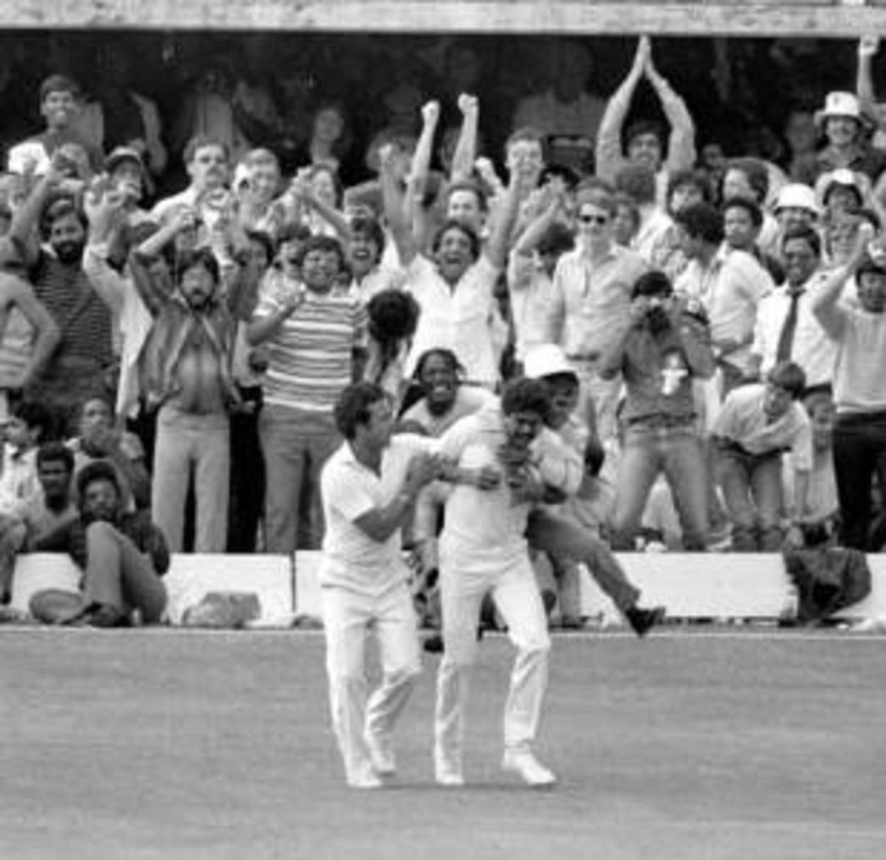 A fan leaps onto Kapil Dev's back after Kapil took a catch to dismiss Viv Richards in the final of the 1983 World Cup