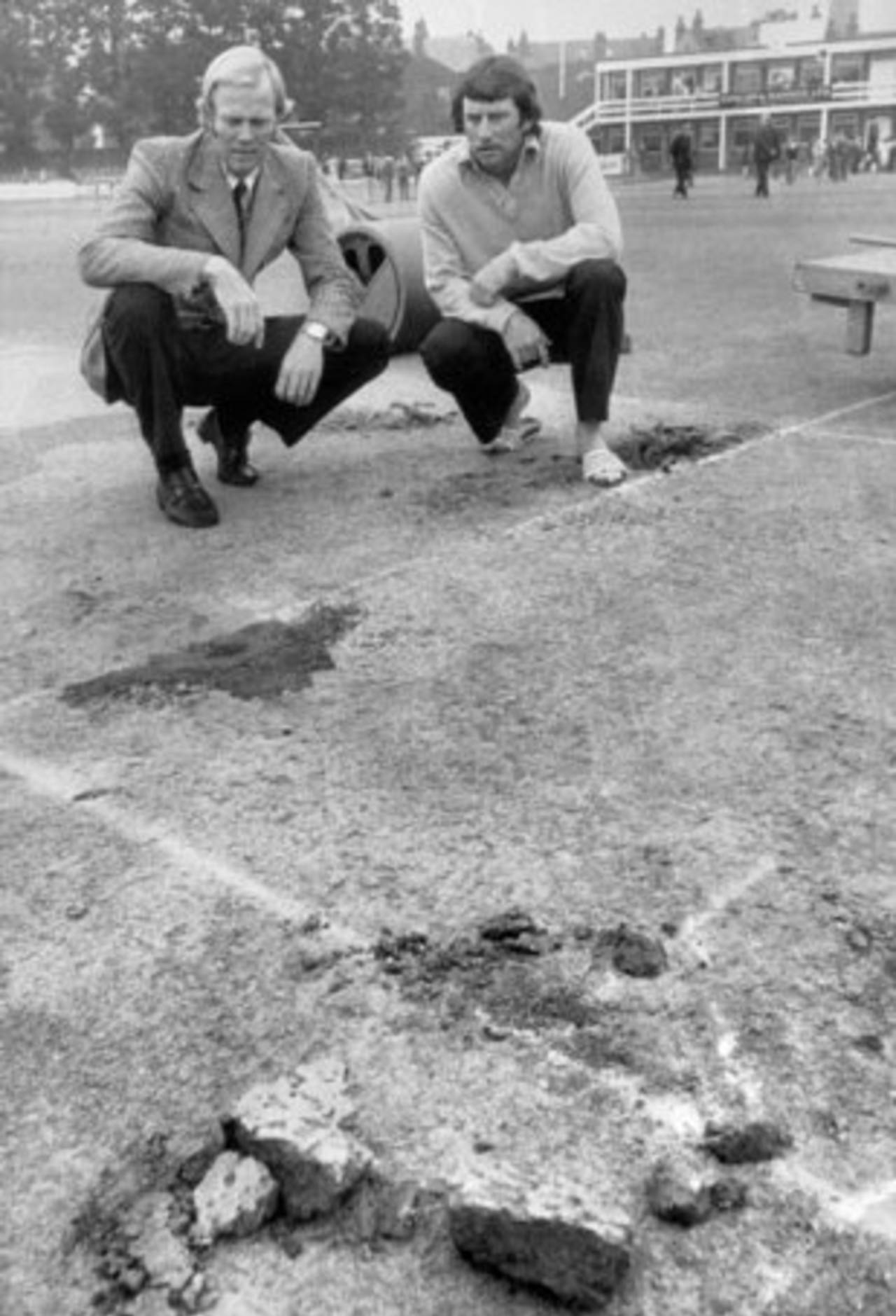 Tony Greig and Ian Chappell inspect the vandalised pitch, England v Australia, 3rd Test, Leeds, August 19, 1975