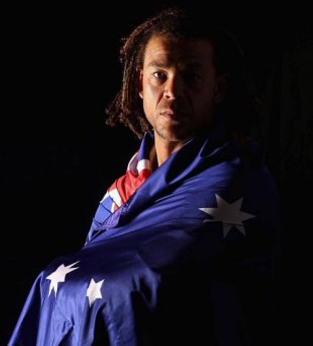 Andrew Symonds poses with the Australian flag, Brisbane, August 27, 2008